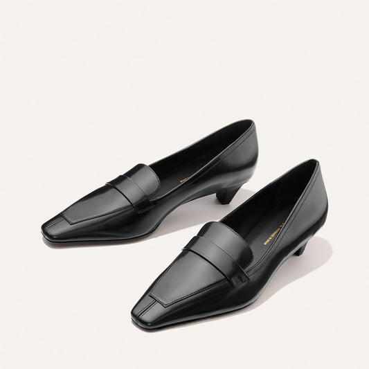 Margaux’s The Sigrid - Black Calf loafers in black leather with a square toe and a small kitten heel.