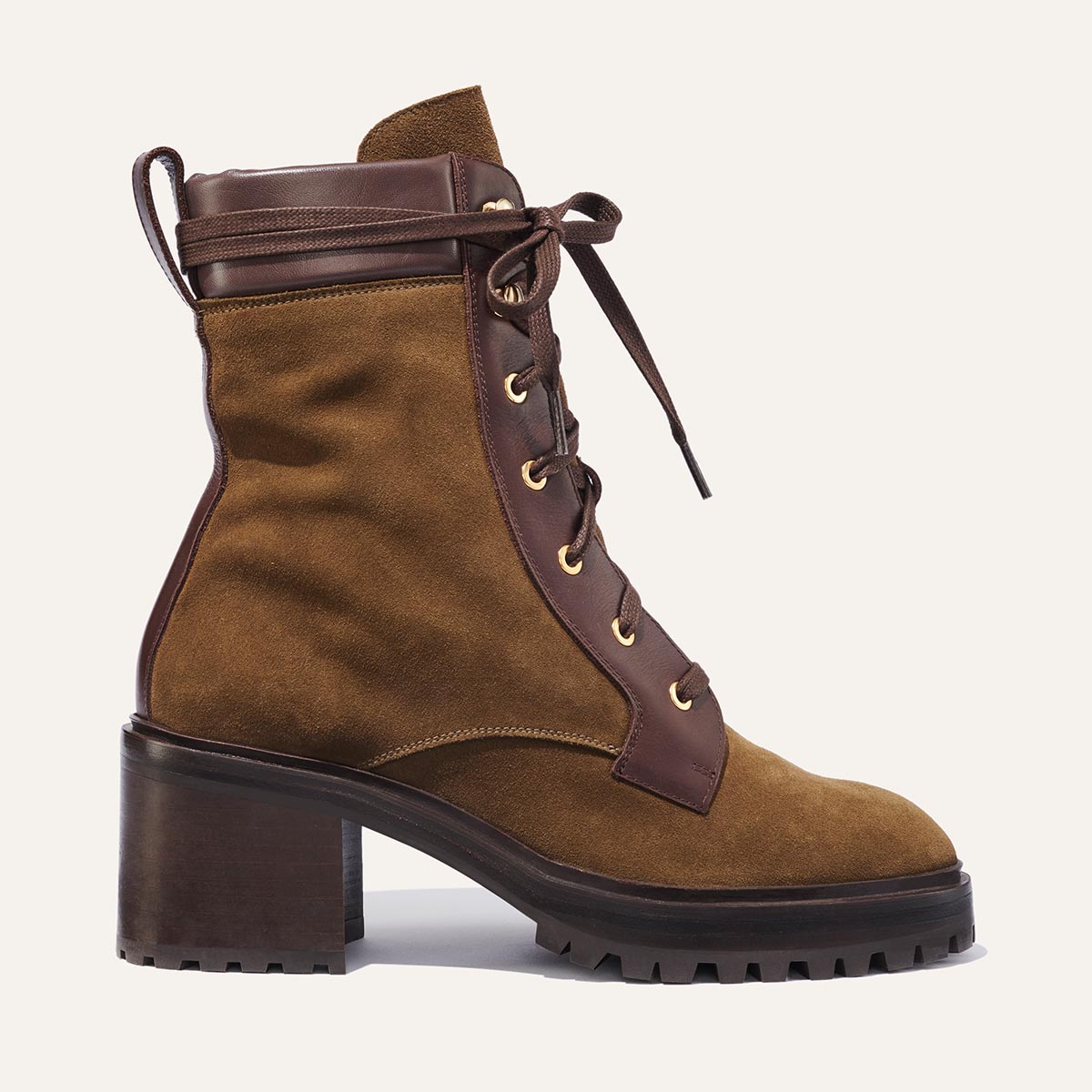 Margaux's classic Skater Boot in weatherproof, moss green German suede with a rubber lug sole and walkable heel