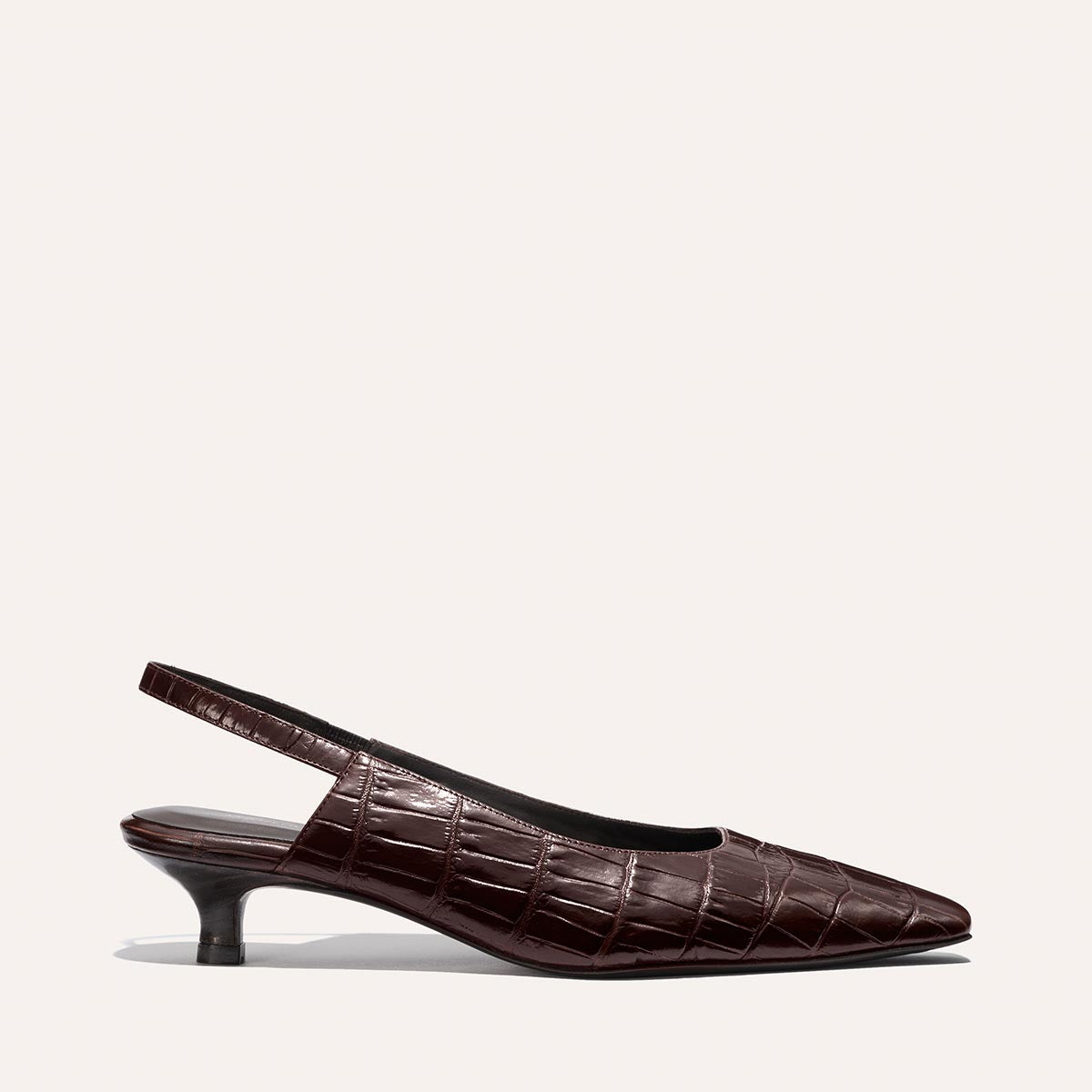 The Sofia Sling - Espresso Croc Embossed by Margaux is a dark brown, crocodile-embossed leather slingback with a snip toe and low kitten heel, shown on a plain light background.