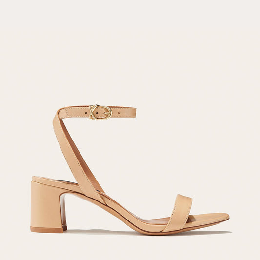 Margaux's classic and comfortable Stella Sandal in soft neutral Italian nappa leather with a perfectly placed strap and a walkable block heel