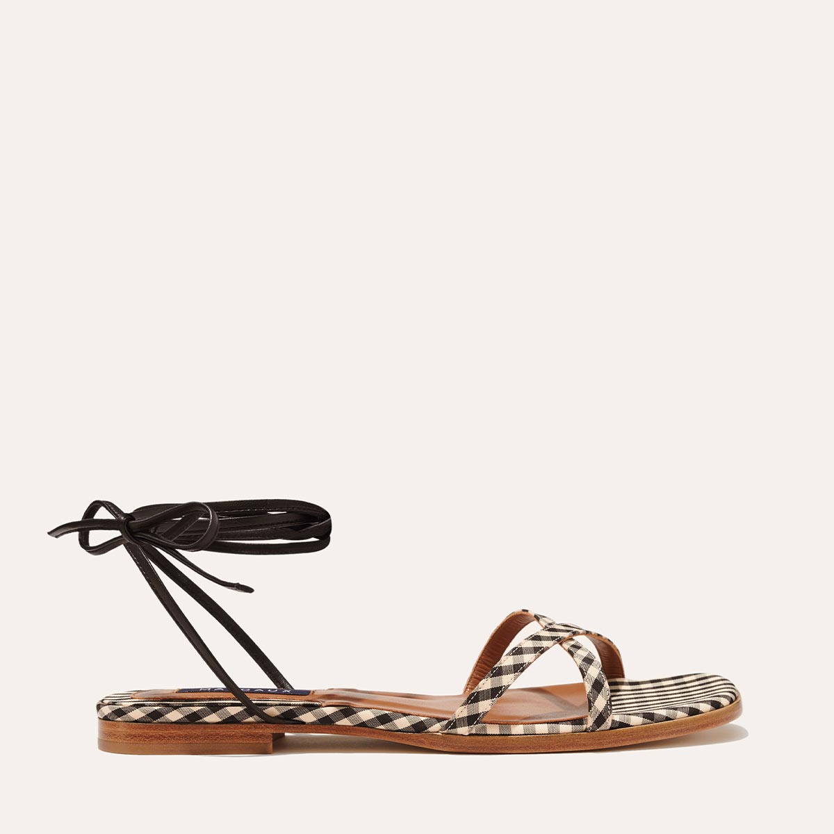 Margaux's classic strappy Wrap Sandal with ankle ties, made in Spain from soft, black Italian nappa leather and gingham fabric