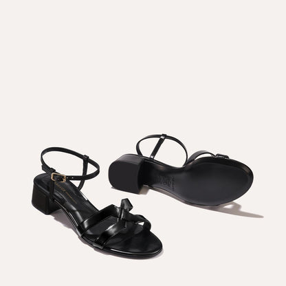 Low heeled sandals shown in black leather