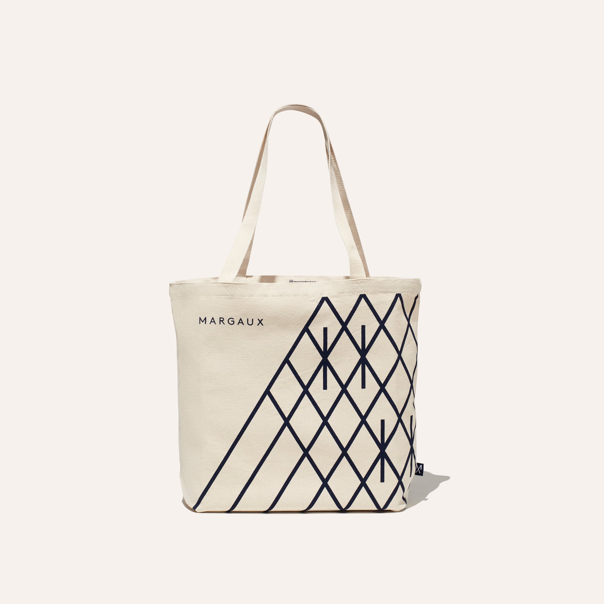 Margaux's cotton tote printed with the brand logo