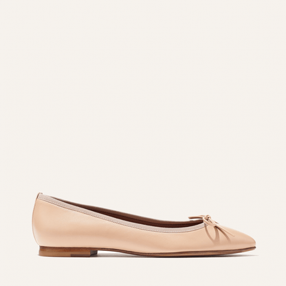The Pointe in Rose Nappa, a classic and comfortable ballet flat featuring a refined pointed toe design and decorative bow. 