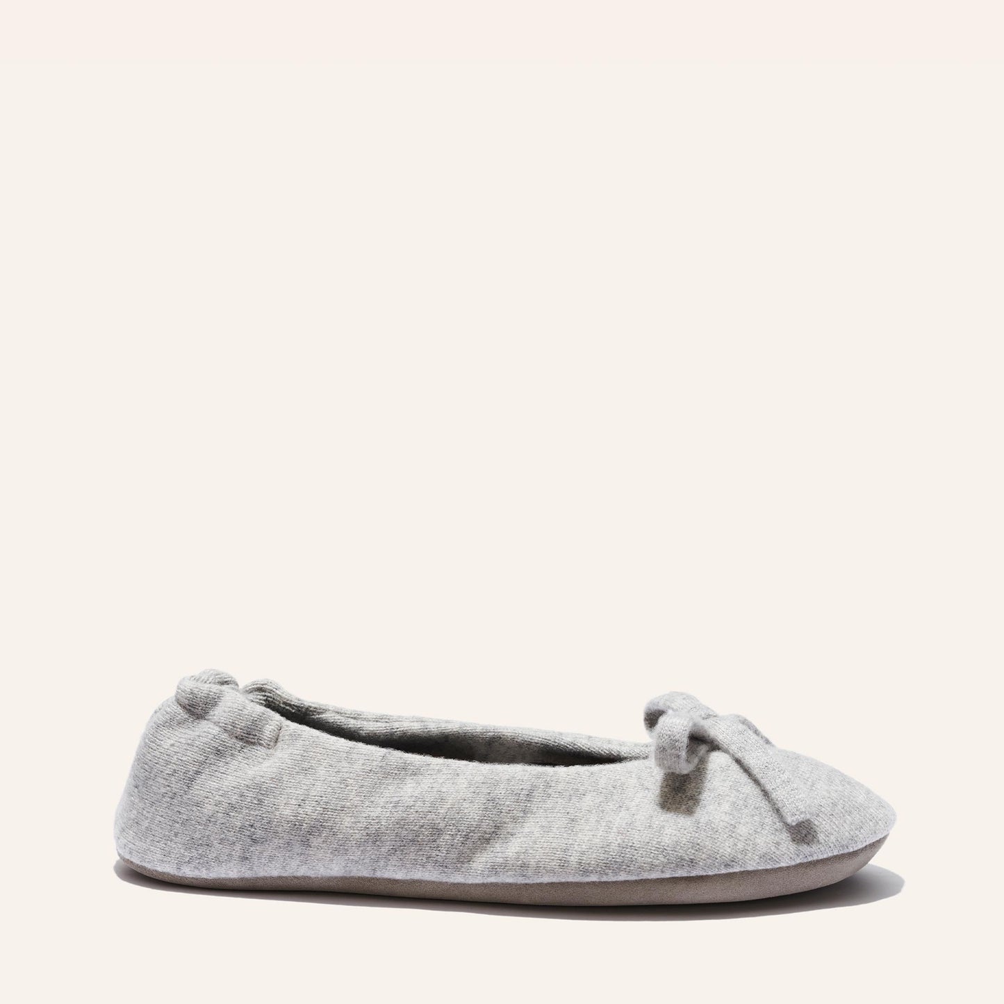 The Ballet Slipper - Heather by Margaux: a cozy, light gray wool-cashmere flat with a bow, featured on a simple background—limited-time find from our archive sale.