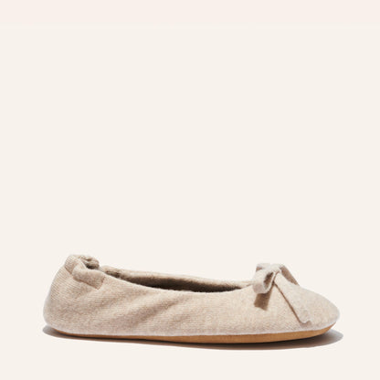 The Ballet Slipper - Oatmeal by Margaux: a cozy beige wool-cashmere flat with a delicate toe bow, displayed on a simple background—an ideal choice for relaxed comfort.