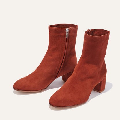The Boot in Brandy Suede, featuring an elegant almond toe and block heel, crafted from high-quality Italian leather for a timeless and modern look.