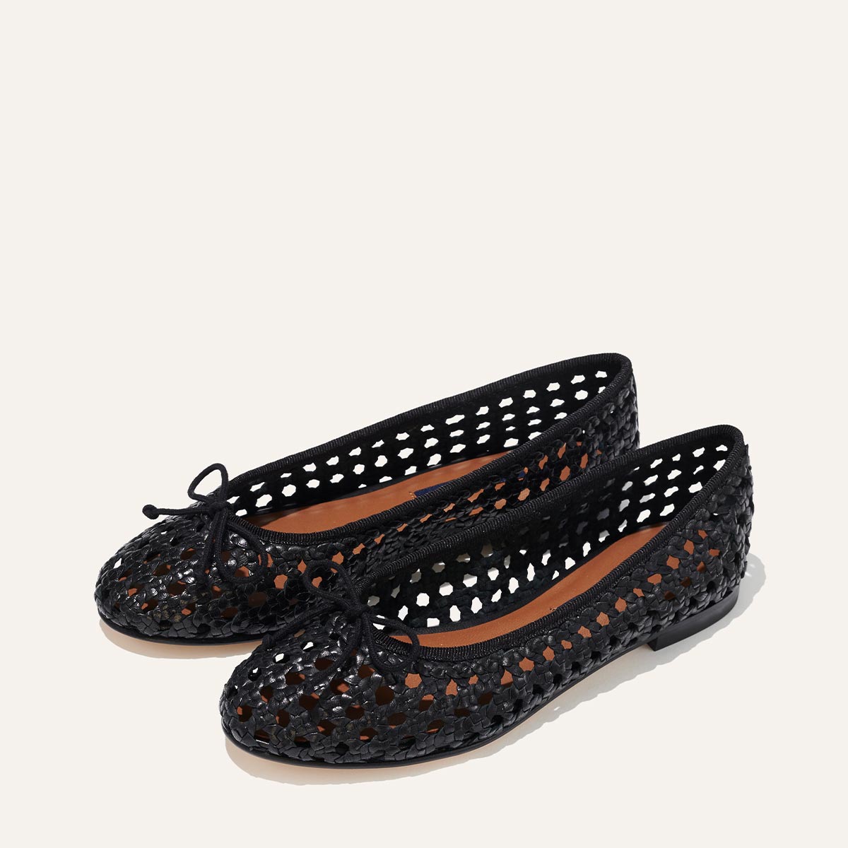 Margaux's classic and comfortable Demi ballet flat, handwoven in India from soft black leather and finished in Spain