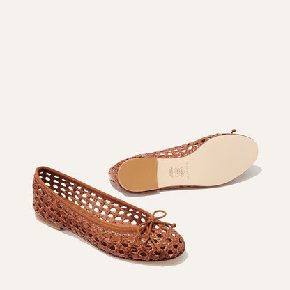 Margaux's classic and comfortable Demi ballet flat, handwoven in India from soft saddle brown leather and finished in Spain