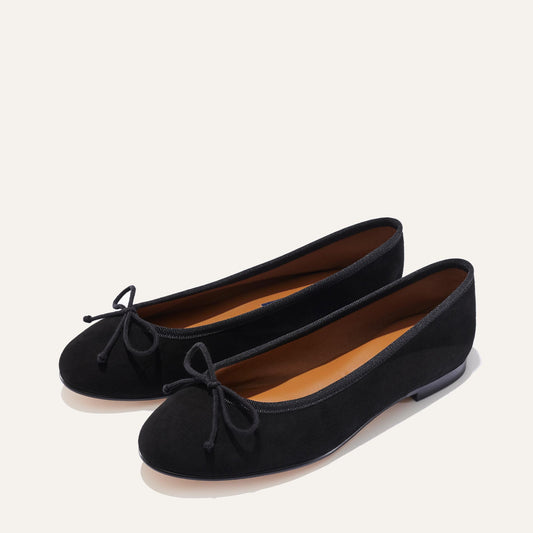 Margaux's classic and comfortable Demi ballet flat, made in a soft, black Italian suede