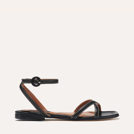 Margaux's classic and comfortable Flat Sandal, made in Spain from soft, black Italian nappa leather