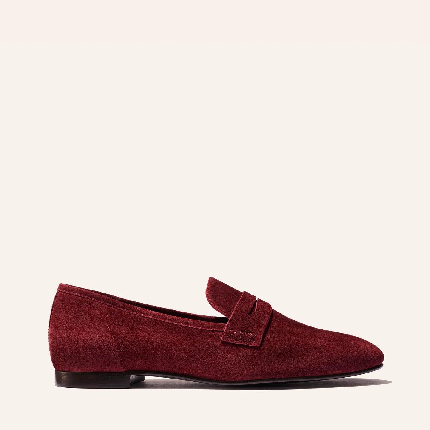 Margaux's classic and comfortable Penny loafer, made in a deep garnet Italian suede